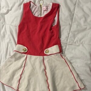 Red and Cream Sleeveless Dress with Gold Button Accents